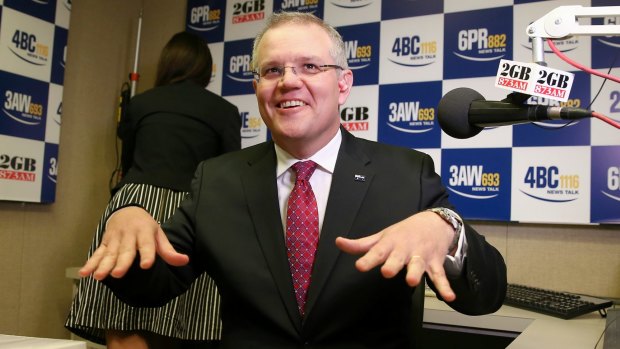 Treasurer Scott Morrison does his Taylor Swift 'shake it off' dance move ahead of a morning radio interview last year.