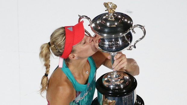 Grand: Angelique Kerber poses with the trophy.