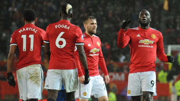 Red army: Romelu Lukaku celebrates scoring Manchester United's third goal.