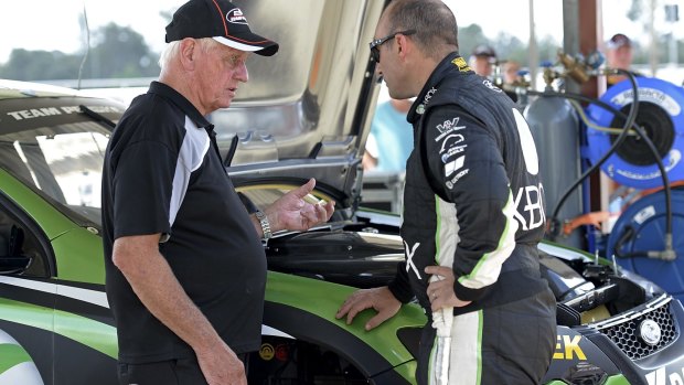 Dick Johnson chats with Ambrose during the same practice session.