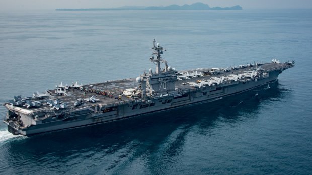 The aircraft carrier USS Carl Vinson transits the Sunda Strait on April 14, 2017 in Indonesia. 