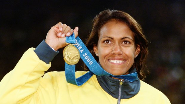 An ecstatic Cathy Freeman, the first Australian to win gold in the women's 400 metres since Betty Cuthbert