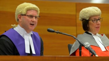 New Chief Judge Peter Kidd on the bench at his welcome with the Chief Justice of Victoria Marilyn Warren.