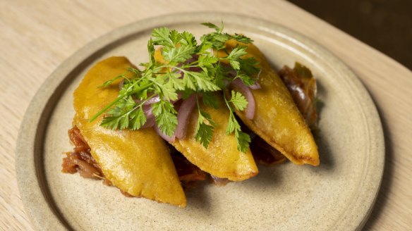 Chicken empanadas with impressively thin house-made shells.