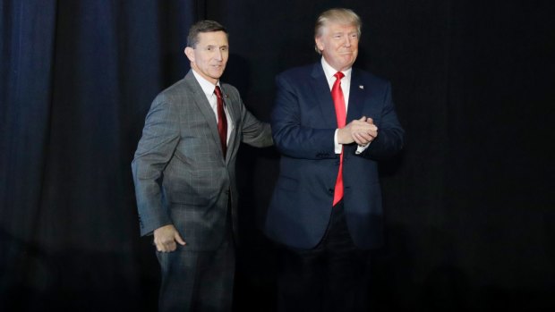 Michael Flynn introduces Donald Trump at a rally during the presidential campaign.
