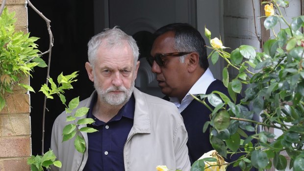 Labour Leader Jeremy Corbyn leaves his home in North London on Sunday.