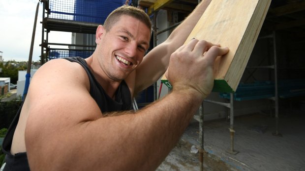 A work in progress: Former Gold Coast and South Sydney forward Paul Carter works on a building site in Bronte.