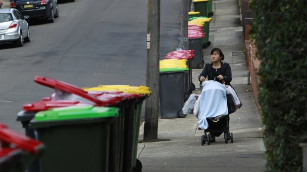 Bins line the street in Ashfield after Transpacific pulled its trucks off the road for safety reasons. 