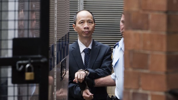 Lian Bin "Robert" Xie leaves the Supreme Court on Tuesday after being granted bail.