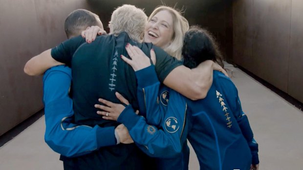 In the video, Beth Moses, the company's chief astronaut instructor, tells Branson "You're late, hurry up".