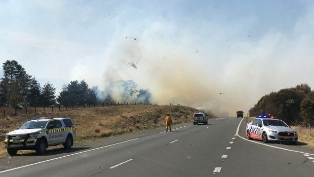 A grass fire is seen along the Hume Highway, north of Goulburn. The blaze prompted the closure of the road in both directions.