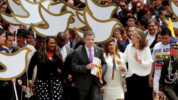 Colombia's President Juan Manuel Santos delivers the original peace deal to Congress.