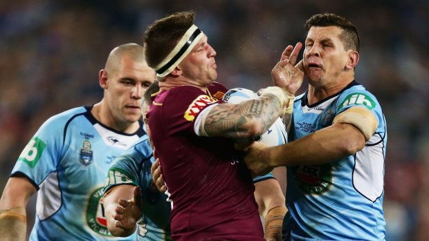 On the charge: Josh McGuire crashes into Greg Bird.