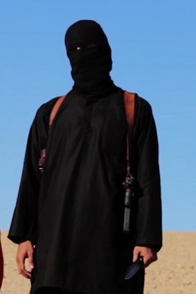 The masked executioner: It is believed "Jihad John" has been injured  in a US air strike.