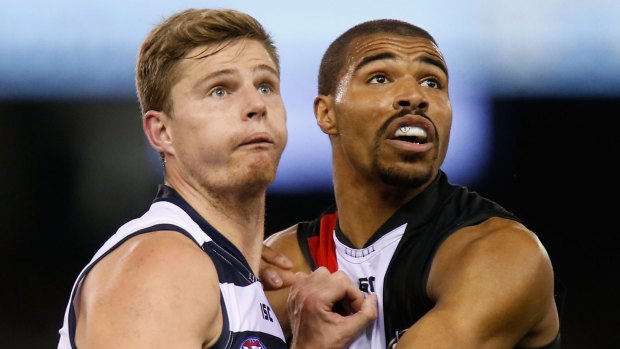 Perseverance: Nathan Vardy in a ruck duel with Jason Holmes of St Kilda late in the season.