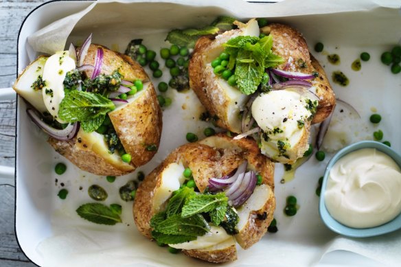 Baked potatoes with peas and pesto.