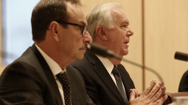 Michael Smith 7-Eleven chairman and Russell Withers 7-Eleven owner appeared before a Senate inquiry.