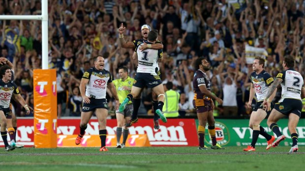 Greatest show in town: the Cowboys celebrate winning the 2015 NRL grand final. 