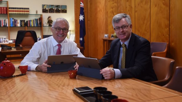 Prime Minister Malcolm Turnbull receives an actual incoming government brief from the Secretary of Prime Minister and Cabinet, Martin Parkinson, at Parliament House.
