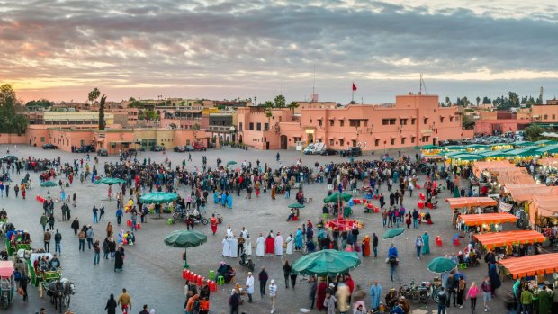 Jemaa el-Fnaa square at sunset.