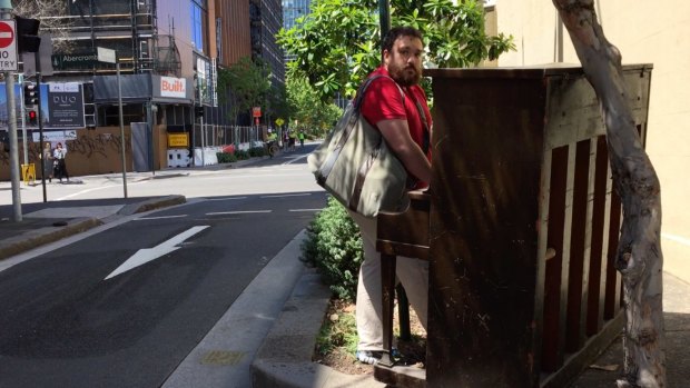 University student Lloyd Ruz says he was "a little bit off in my own world" when he played the abandoned piano.