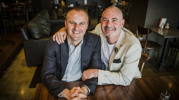 Chief Minister Andrew Barr and his partner Anthony Toms in 2014. Mr Barr says he will actviely campaign for a "yes" vote in the same-sex postal vote.