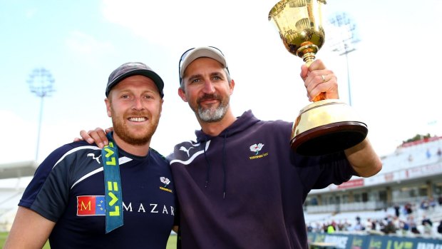 Jason Gillespie (right) with Yorkshire captain Andrew Gale after winning the county championship in September.