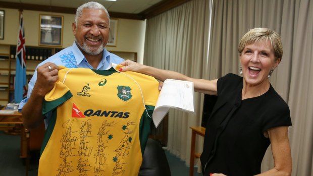 Team gesture: Frank Bainimarama with Foreign Affairs Minister Julie Bishop this year.