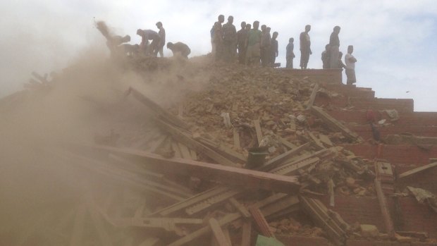 Volunteers help with rescue work at the site of a building collapse in Kathmandu in April.