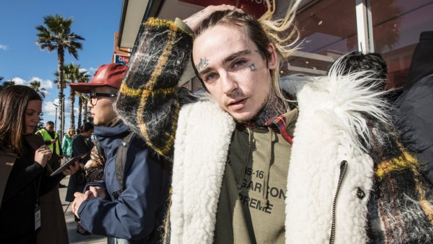 Aidan Nunan from Campbelltown is one of hundreds that  queued to buy fashion from the Louis Vuitton x Supreme collaboration. 