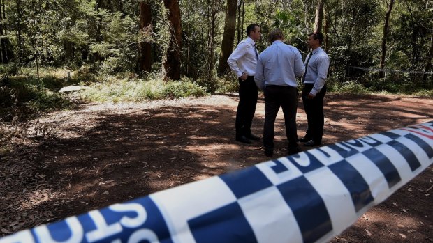Detectives from the homicide squad at a crime scene in the Royal National Park.