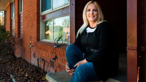 Melissa Freeman of Kambah in her 'forever home' after spending three years couch surfing. 