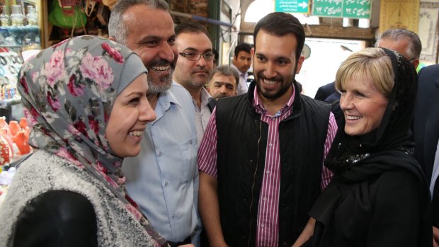 Locals flocked around Foreign Minister Julie Bishop in the crowded alleys of Tajrish bazaar.