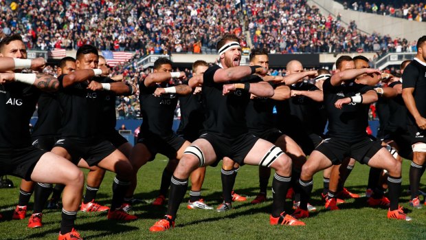 The New Zealand All Blacks performing a Haka against the American Rugby Team in Chicago, 2014.