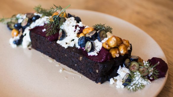 Beetroot bread with beetroot puree, buttermilk curd, blueberries and dill.