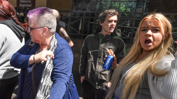 Supporters of Sebastian Kennett leave Melbourne Magistrates Court on Monday after a hearing. Mr Kennett has been charged over the death of Lynda Hansen.