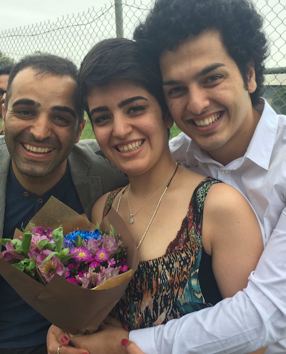 Mojgan Shamsalipoor after her release from detention in September 2016, with her brother Hossein and husband Milad Jafari.