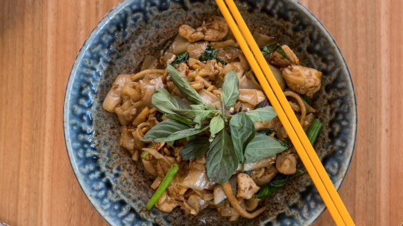 Pad khee mao with rice noodles and vegetables.