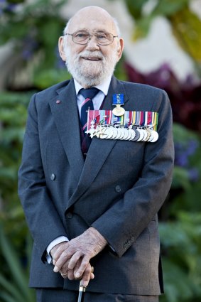 Lieutenant Commander Henry Hall at Government House after being invested with the Medal of the Order of Australia (OAM).