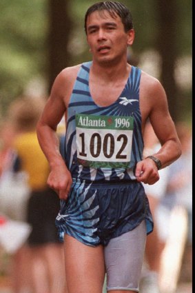 Never say die: Abdul Baser Wasiqi of Afghanistan competing during the Olympic marathon in 1996.