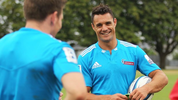 All Blacks star Dan Carter shares a laugh at training with Crusaders team-mate Colin Slade.