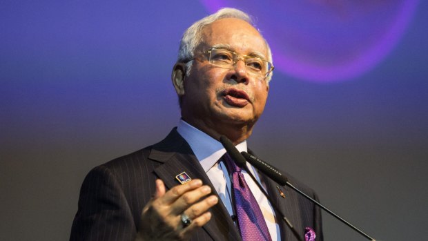 A spokesman for Najib Razak says corruption links to the Malaysian Prime Minister are 'baseless smears and insinuations'.