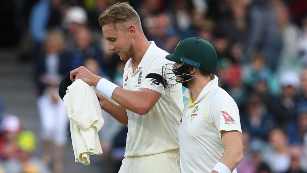 Steve Smith  has words with Stuart Broad at the end of his over.