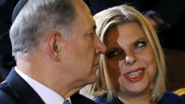 The couple's lifestyle has become a focus of the current political campaign in Israel: Prime Minister Benjamin Netanyahu listens to his wife Sara in 2013.