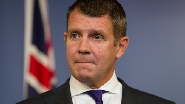 Premier Mike Baird struggled to contain his emotions at a press conference announcing his resignation.