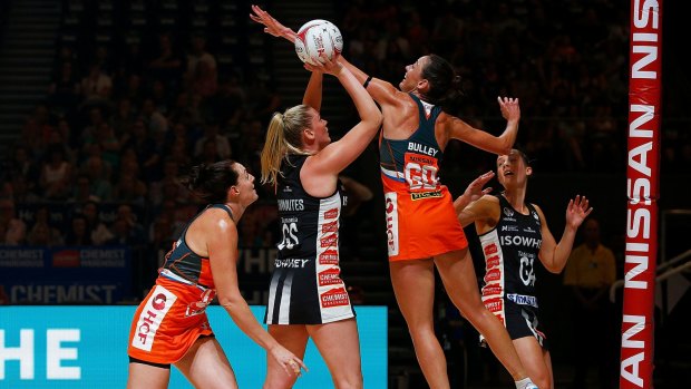 Collingwood's Caitlin Thwaites takes a shot against the Giants.