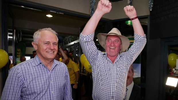 Prime Minister Malcolm Turnbull and New England candidate Barnaby Joyce celebrate at Barnaby Joyce's election night party.