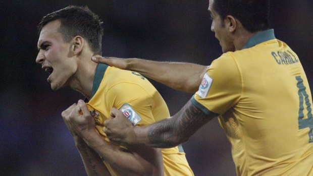 Trent Sainsbury opens the scoring for the Socceroos in their semi-final against the United Arab Emirates.