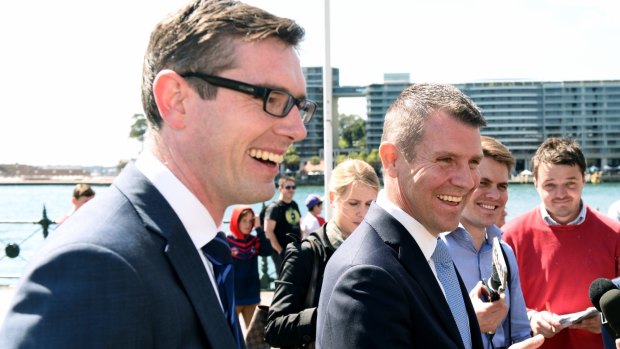 Finance Minister Dominic Perrottet and Premier Mike Baird remain under fire over the property acquisition process for WestConnex
