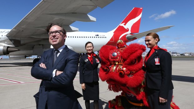 Qantas chief executive Alan Joyce at Sydney Airport on Thursday where he announced the resumption of direct flights to Beijing. 